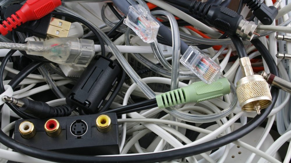 An assortment of cable TV and audio wires after cutting the cable cord on a television.