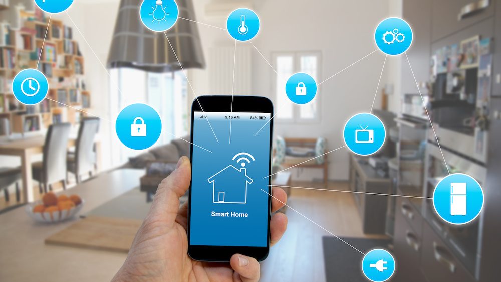 Smart home devices concept, smartphone with smart home applications on screen.