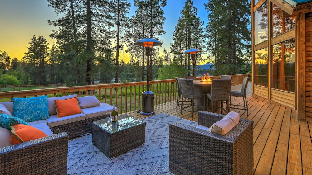 Beautiful deck during evening with new modern outdoor furniture.