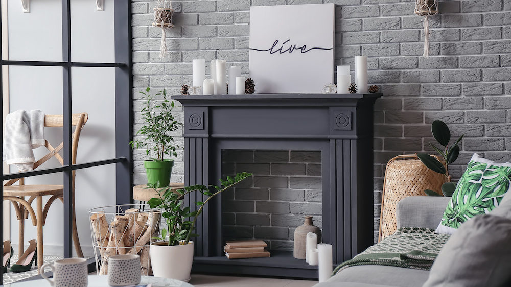 Interior of modern living room with decorative fireplace mantel.